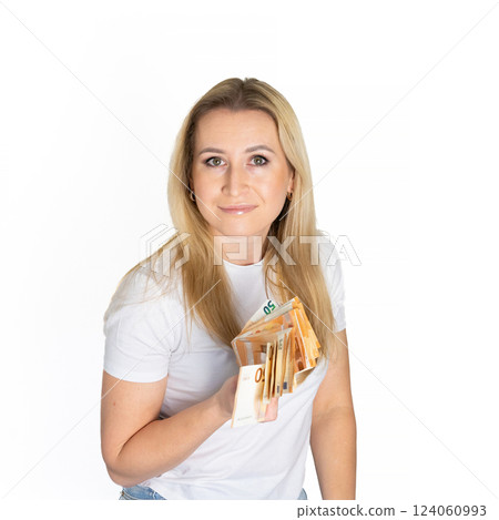 Woman in white t-shirt with dollars in hand. Portrait blonde woman holding money bills. Blond girl holding cash money in euro. Woman holding lots of money in euro currency. Luxury, and money concept. Woman in white t-shirt with dollars in hand. Portrait blonde woman holding money bills. Blond girl holding cash money in euro. Woman holding lots of money in euro currency. Luxury, and money concept. 124060993