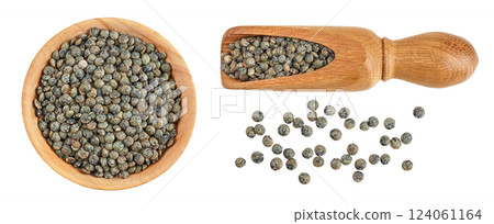 raw french green lentils in wooden bowl and scoop isolated on white background. Top view. Flat lay raw french green lentils in wooden bowl and scoop isolated on white background. Top view. Flat lay 124061164