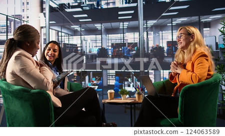 Ambitious businesswomen collaborating in a corporate office, fostering gender equality in a men dominated business industry. and leadership growth. Success driven powerful leaders. Camera B. Ambitious businesswomen collaborating in a corporate office, fostering gender equality in a men dominated business industry. and leadership growth. Success driven powerful leaders. Camera B. 124063589