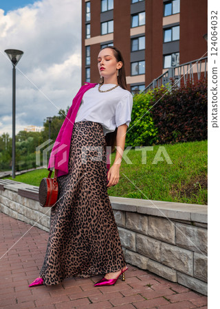 Portrait of Confident Woman in Urban Fashion. Bold Colors and Stylish Outfit 124064032