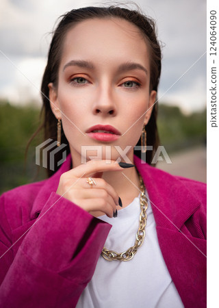 Stylish Young Woman in Magenta Blazer with Gold Jewelry . Fashion Portrait Stylish Young Woman in Magenta Blazer with Gold Jewelry . Fashion Portrait 124064090