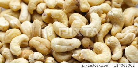 Cashew nuts on white background. Cashew nuts on white background. 124065002