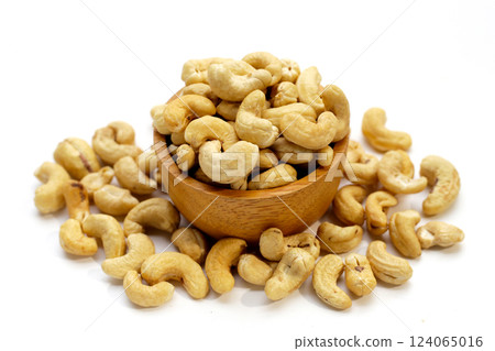 Cashew nuts on white background. Cashew nuts on white background. 124065016