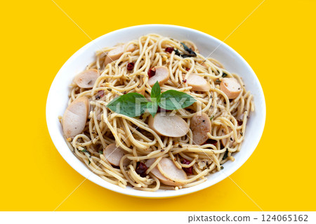 Spaghetti with dried chili and hot dogs 124065162