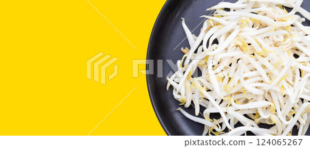 Bean sprouts on yellow background Bean sprouts on yellow background 124065267