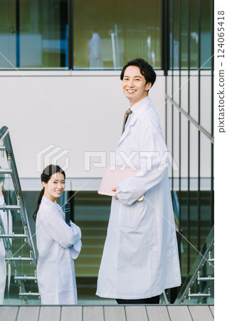 Young male and female doctors working at a hospital. Photo courtesy of LINK FOREST Young male and female doctors working at a hospital. Photo courtesy of LINK FOREST 124065418