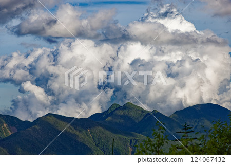 Clouds rising from Mt. Karasugatake as seen from Senmaigoya in the Southern Alps Clouds rising from Mt. Karasugatake as seen from Senmaigoya in the Southern Alps 124067432