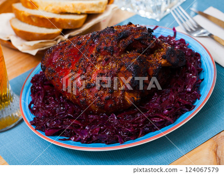 Baked in beer pork knuckle 124067579