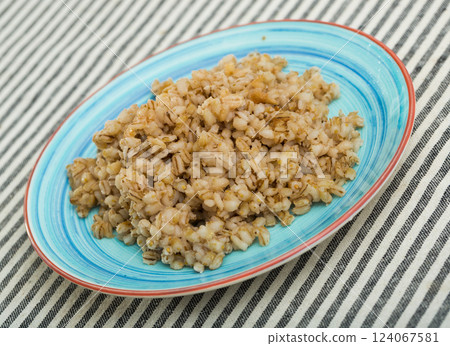 Cooked pearl barley porridge Cooked pearl barley porridge 124067581