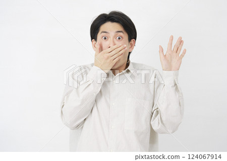 Man in his 20s, surprised, white background 124067914