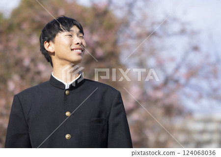 High school boy looking up at the sky 124068036