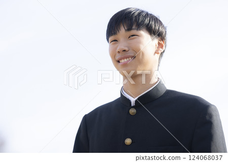 Male high school student in uniform 124068037