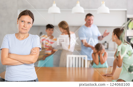 Irritated mom is tired of noise and screams of the children at home 124068100