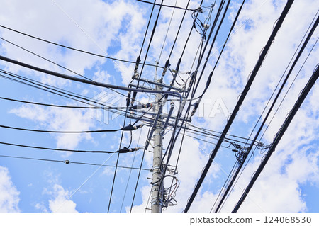 Power lines in the city 124068530