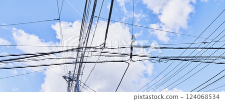 Power lines in the city 124068534