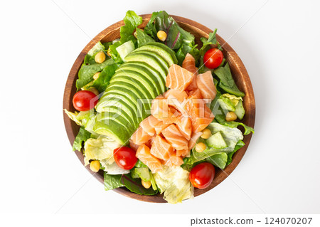 Avocado and Salmon Salad on a White Background Avocado and Salmon Salad on a White Background 124070207