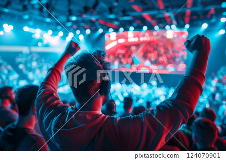 Esports Gamer Celebrating Victory in Tournament Esports Gamer Celebrating Victory in Tournament 124070901