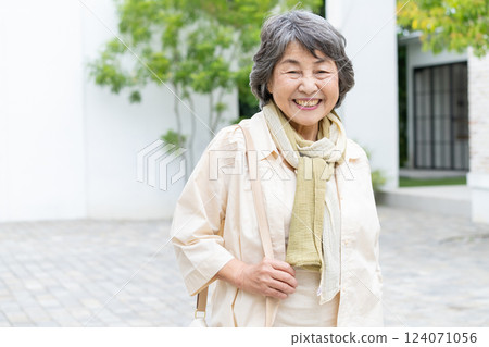 Senior woman traveling Senior woman traveling 124071056
