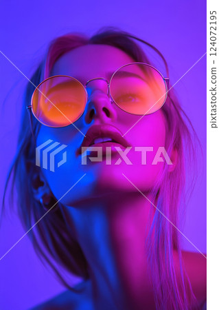 UV portrait of woman in neon lighting with round sunglasses UV portrait of woman in neon lighting with round sunglasses 124072195