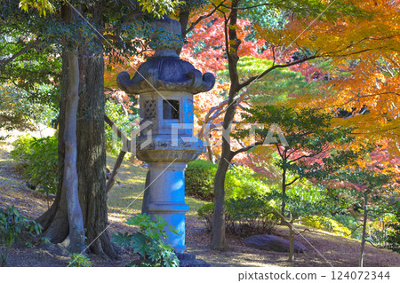 Japanese Stone Lantern Decorated Amid Vibrant Autumn, Tokyo Dec 6 2024 124072344