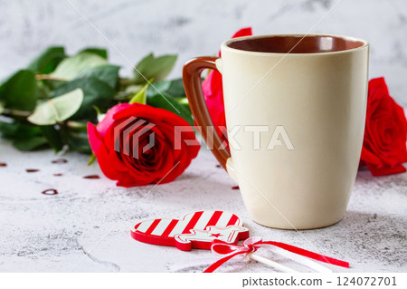 Valentine's Day Concept. Coffee mug with red roses on Ultimate Gray background. Space for text or design. 124072701