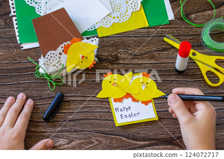 Instruction step 15. Child gift postcard happy easter chickens toy on a wooden table. Handmade. Project of children's creativity, handicrafts, crafts for kids. Instruction step 15. Child gift postcard happy easter chickens toy on a wooden table. Handmade. Project of children's creativity, handicrafts, crafts for kids. 124072717
