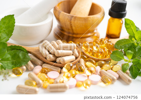 Alternative medicine herbal organic capsule, mineral, drug with herbs leaf natural supplements for healthy good life. 124074756