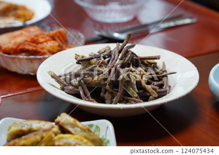 Blanched bracken fernbrake with sesame oil is a Korean side dish. 124075434
