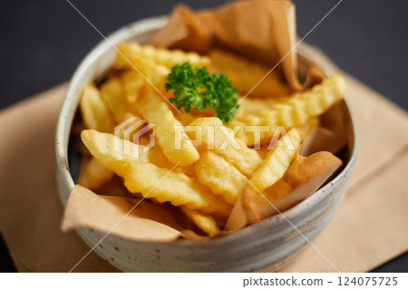 Close up Crispy tasty french fries Close up Crispy tasty french fries 124075725