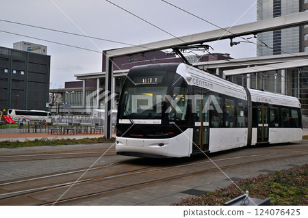 Tram running in front of Toyama Station Tram running in front of Toyama Station 124076425