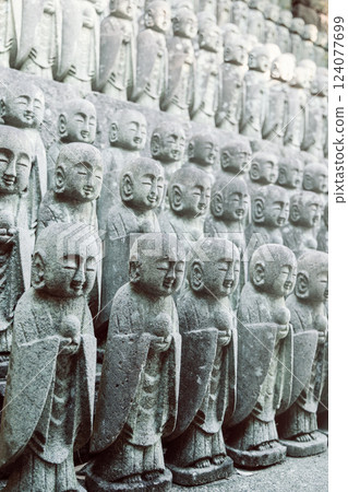 Vertical photo of Jizo statues at Hase temple Kamakura Japan 124077699