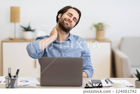 Neck Pain. Tired Businessman Massaging Aching Neck Having Health Problems After Computer Work Sitting At Laptop In Modern Office. Arthritis, Muscle Spasm And Poor Posture Concept. Selective Focus 124081742