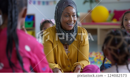 A youth activist mentors young girls, sharing inspiring stories and advice to help them realize their potential. A youth activist mentors young girls, sharing inspiring stories and advice to help them realize their potential. 124082573