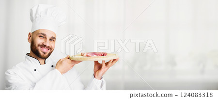 Meat Recipes. Male Chef Holding Fresh Beef Steak On Chopping Board Standing In Kitchen. Selective Focus 124083318