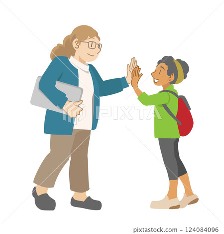 A dark-skinned girl high-fives a white female teacher A dark-skinned girl high-fives a white female teacher 124084096