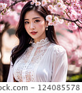 Cherry blossoms in full bloom and a beautiful woman in white clothes 124085578