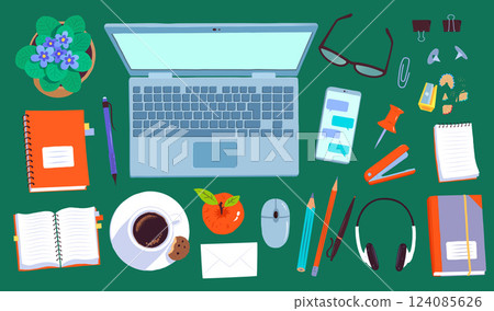 Workspace with a laptop and office supplies 124085626