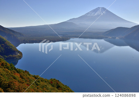 Mount Fuji as seen from Nakanokura Pass Observatory in the Tenshi Mountains and its reflection in Lake Motosu with autumn foliage Mount Fuji as seen from Nakanokura Pass Observatory in the Tenshi Mountains and its reflection in Lake Motosu with autumn foliage 124086898