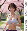 A cherry blossom viewing runner woman wearing a gray crop top 124087485