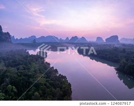 Colorful sunset or sunrise sky clouds over sea, Amazing nature landscape seascape,Beautiful light nature landscape colorful sky background,High angle view drone shot 124087917