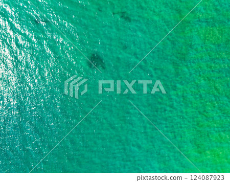 Sea surface aerial view,Bird eye view photo of waves water surface texture,Summer sea background,Beautiful nature Amazing view sea background 124087923