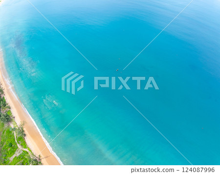 Top view Beautiful beach nature sea,Amazing landscape waves crashing on sand in summer background,Wide angle drone shot Top view Beautiful beach nature sea,Amazing landscape waves crashing on sand in summer background,Wide angle drone shot 124087996