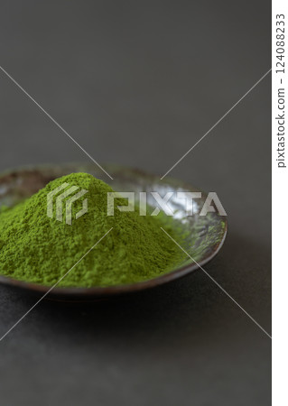 Matcha powder served on a small plate Matcha powder served on a small plate 124088233
