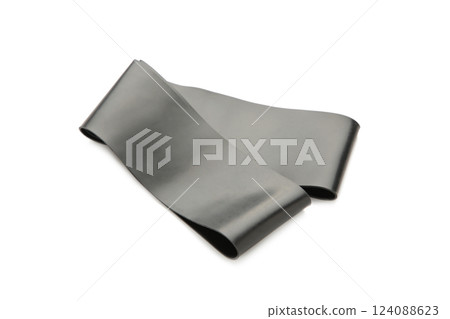 Black latex rubber band for fitness isolated on a white background. Sports concept. Home fitness workout trend. 124088623