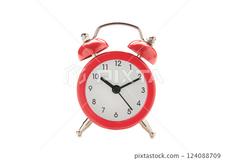 Retro red alarm clock isolated on white background Retro red alarm clock isolated on white background 124088709