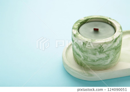Mint plaster trays on blue background. Stands for candles or jewelry Mint plaster trays on blue background. Stands for candles or jewelry 124090051