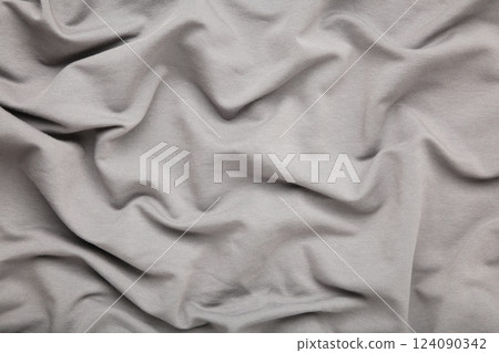 Crumpled grey fabric texture. Space for text 124090342