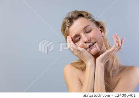 Captivating Portrait of a Serene Woman with Closed Eyes, Expressing Softness and Tranquility Against a Light Gray Background, Evoking a Sense of Calm and Peacefulness Captivating Portrait of a Serene Woman with Closed Eyes, Expressing Softness and Tranquility Against a Light Gray Background, Evoking a Sense of Calm and Peacefulness 124090401