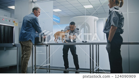 Airport Terminal: Mature Man with Chihuahua at Security Checkpoint 124090909