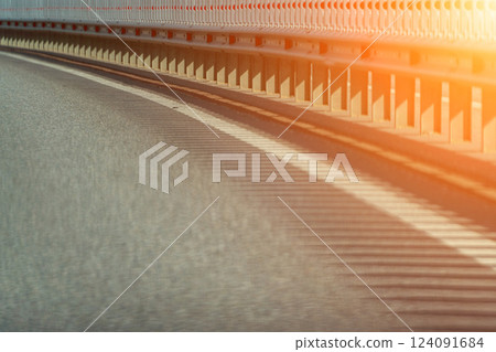 Safety barriers on highway. Anodized safety steel barrier. Enhancing highway safety. Safety barriers on highway. Anodized safety steel barrier. Enhancing highway safety. 124091684